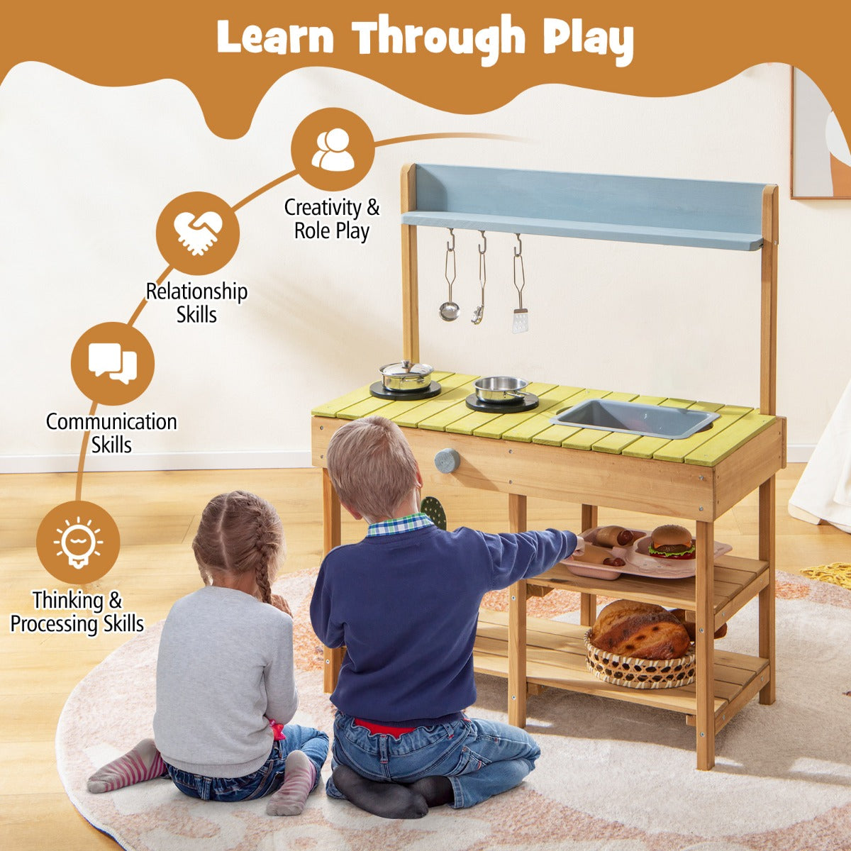 Children learning through play with the outdoor mud kitchen set