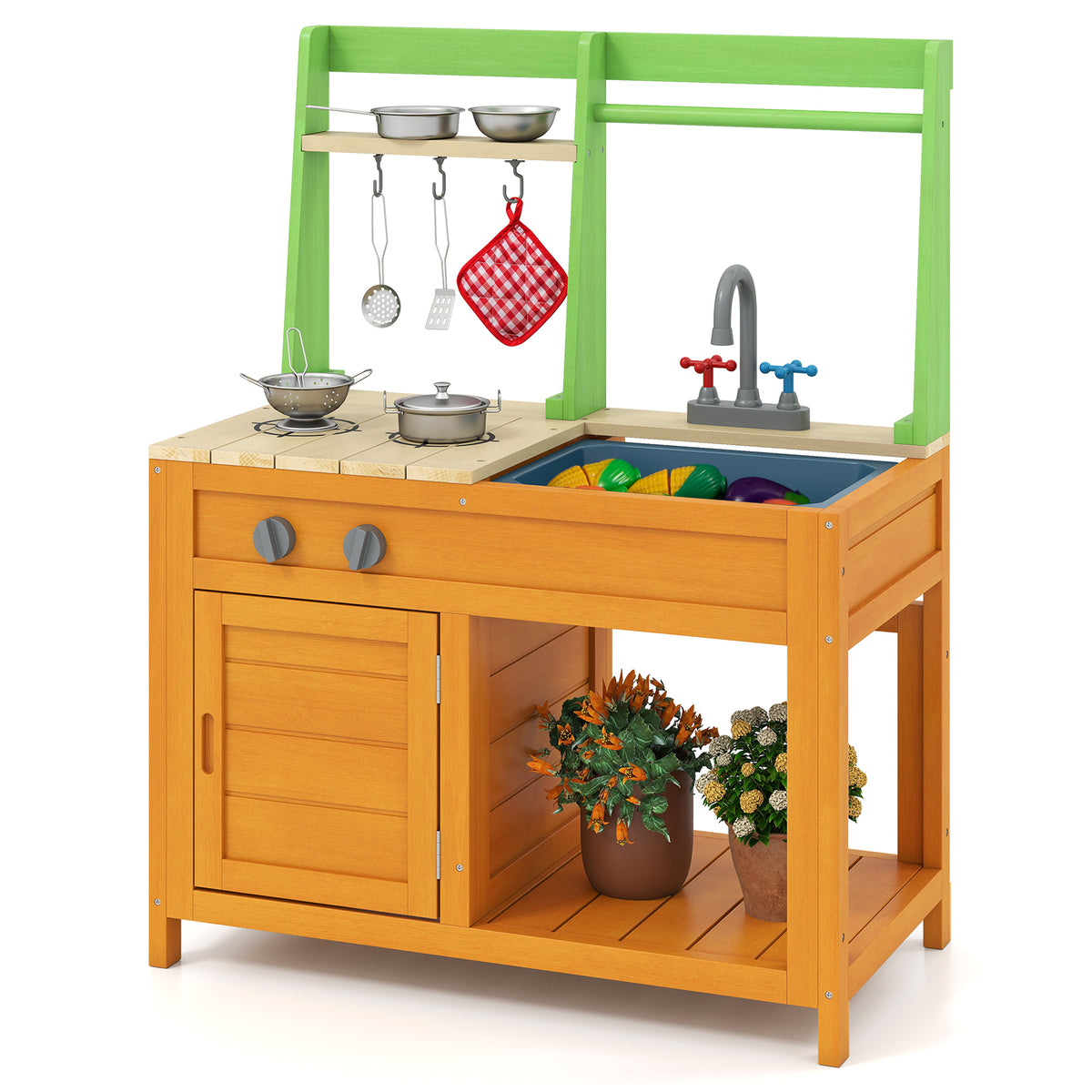 A close-up view of the outdoor play kitchen set, showing the hob, sink, taps and storage cupboard