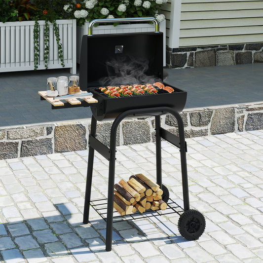 Outdoor Grills cooking food on a barbecue with a foldable side table and a shelf of logs below