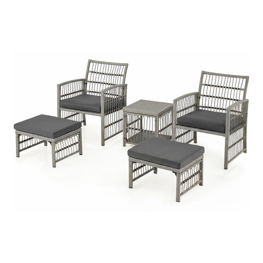 Outdoor Rattan Conversation Set with two chairs, two ottomans and a coffee table