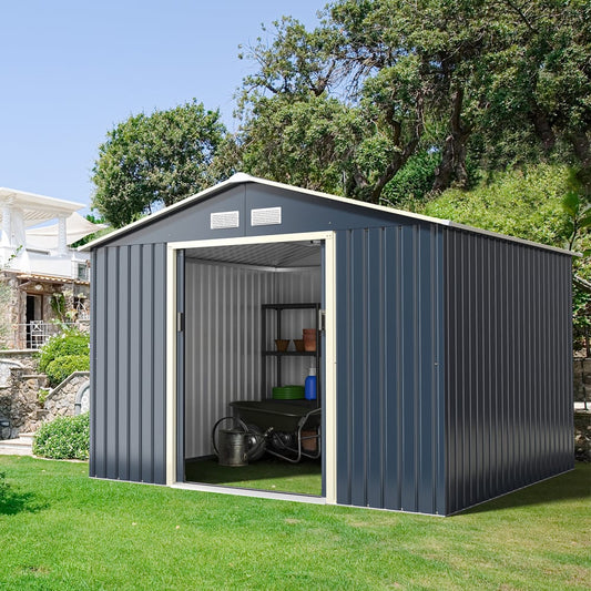 The grey metal garden shed with the sliding door open, showing storage shelves and a wheelbarrow inside