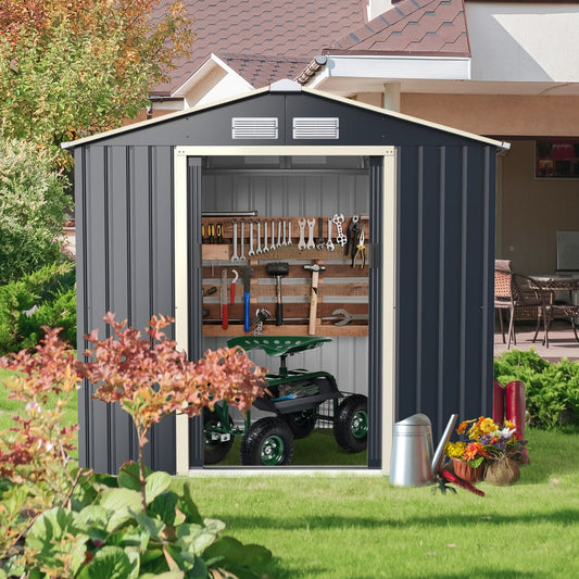 The outdoor storage shed with tools and a garden cart inside, showing its spacious interior