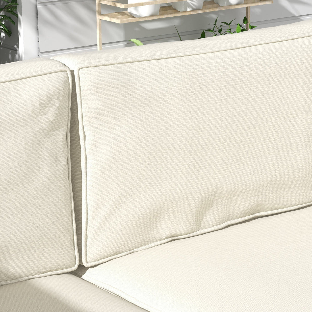 Close up of the stitching and texture of the cream back cushions