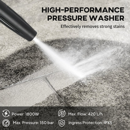 The pressure washer nozzle spraying water onto a stone patio to demonstrate cleaning performance