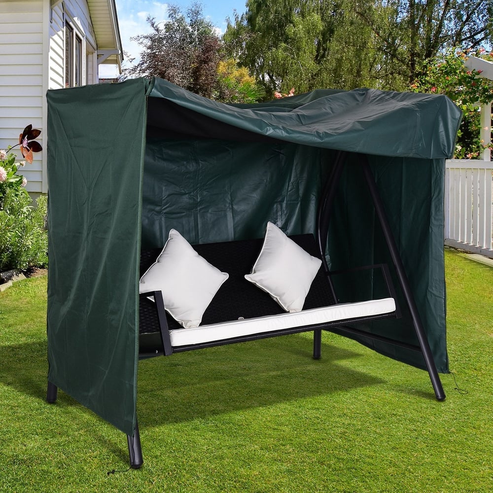 Green protective cover on a three-seater garden swing with cushions