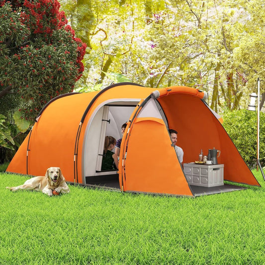The orange camping tent set up on a lawn with people and a dog inside and around it