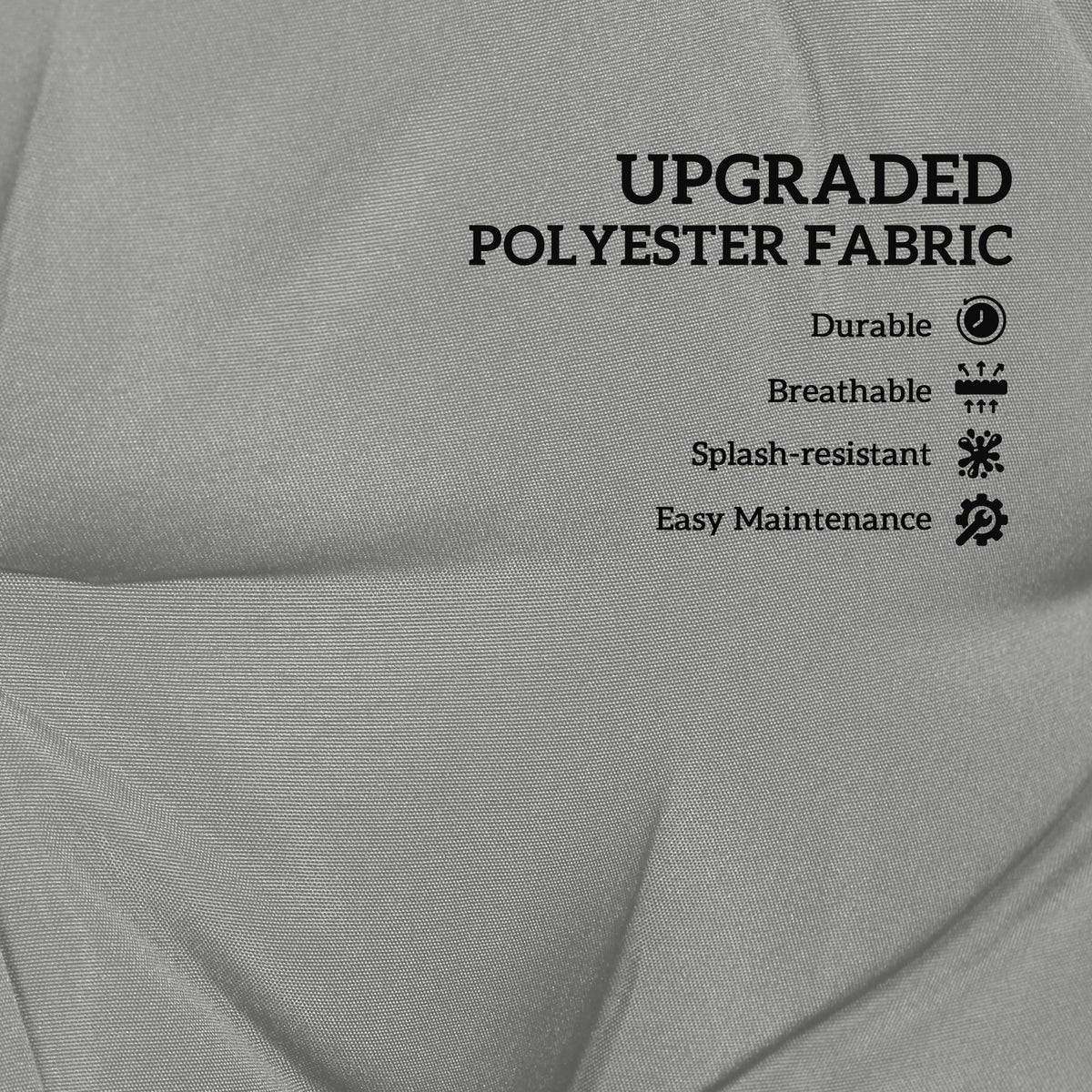 Close up of the light grey cushion fabric showing text about polyester
