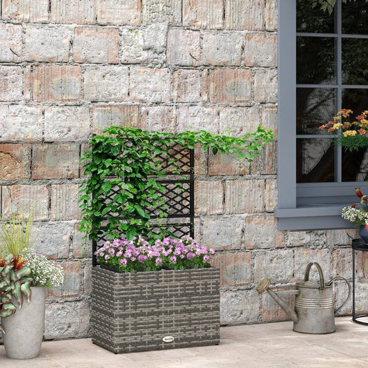 The grey rattan planter with trellis is shown against a brick wall, with a window and watering can nearby