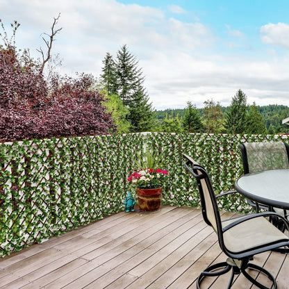 The expanding garden trellis used as a privacy screen on a wooden deck with outdoor furniture