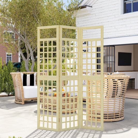 The wooden garden privacy screen is set up on a patio next to outdoor furniture