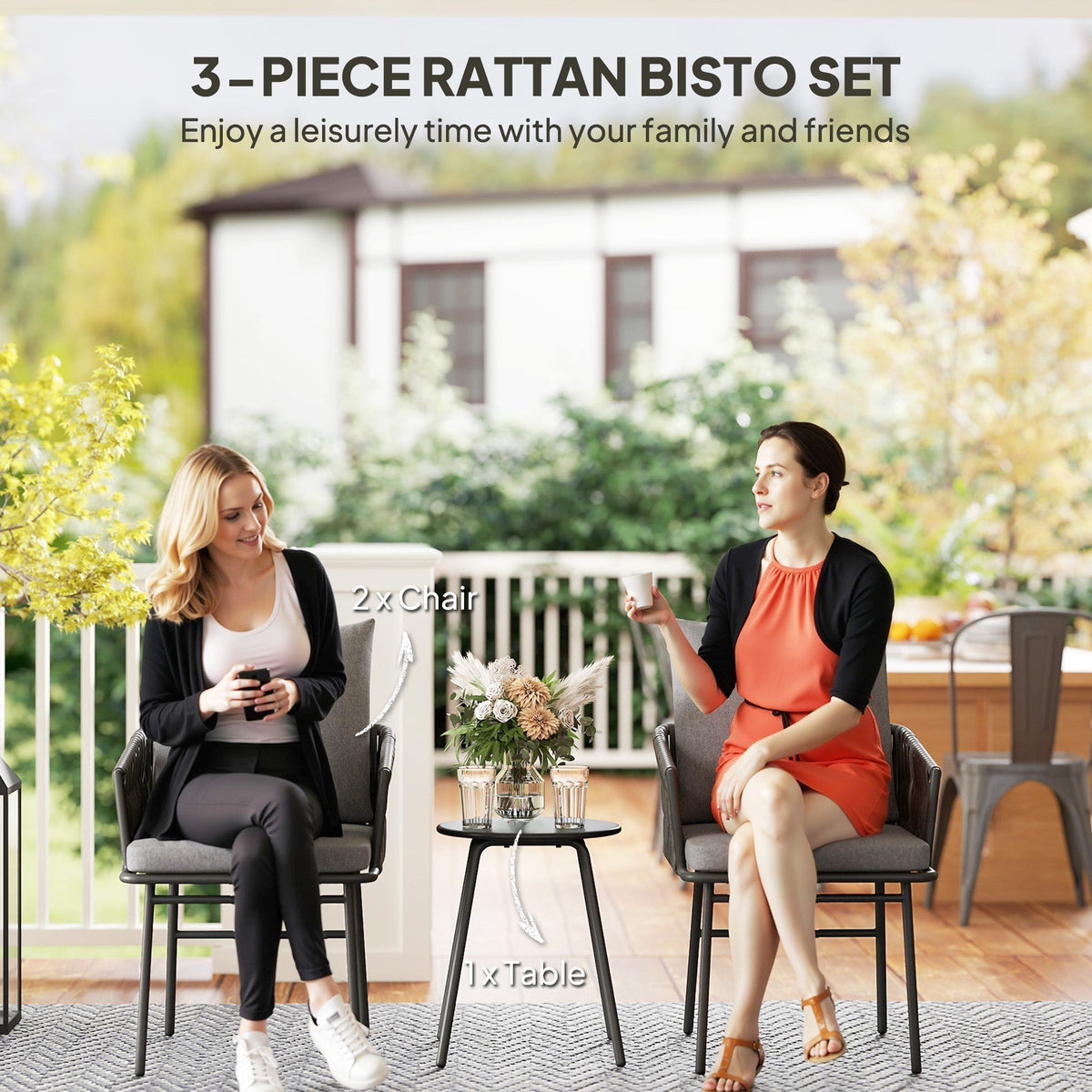 Two women sitting on the rattan furniture set on a balcony with a table between them