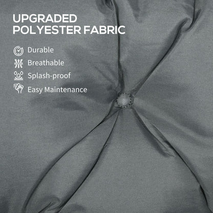 Close up of the dark grey polyester fabric on the garden chair cushion, labelled durable and splash-proof