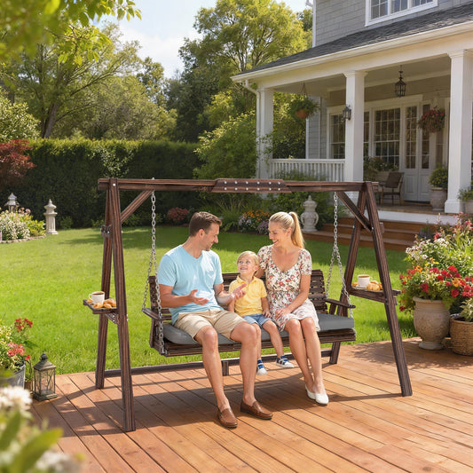 A family relaxing on the wooden garden swing seat on a sunny patio