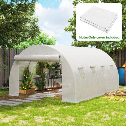 The replacement greenhouse cover installed over a tunnel frame in a garden setting
