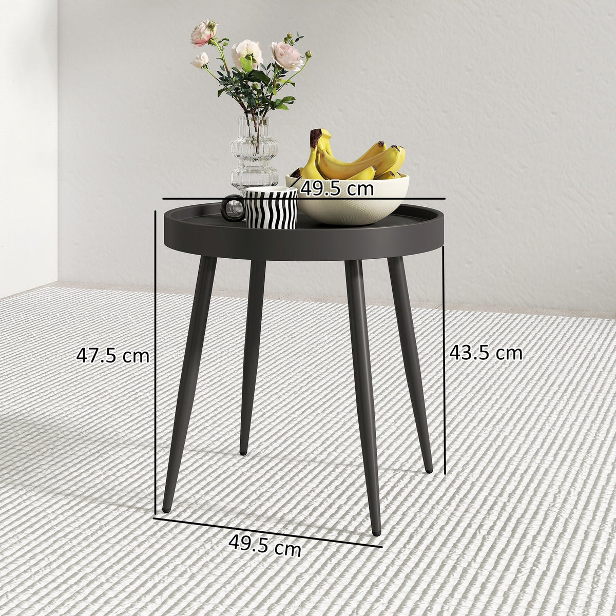 A black round garden table with dimensions shown for height and diameter