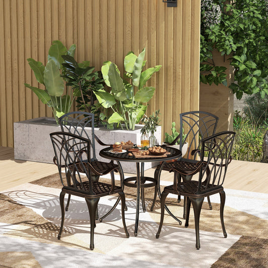 The garden dining set arranged on a patio with plants and food on the table