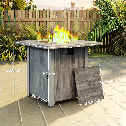 The gas fire pit table shown with dimensions for its height, width and depth