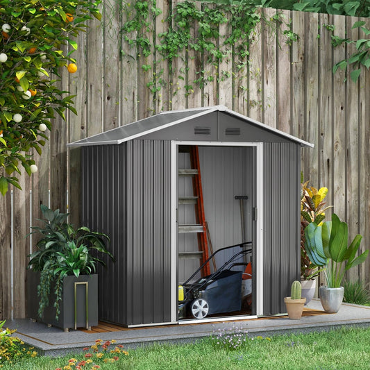 The garden shed is shown with one door open, revealing a lawnmower and plants inside