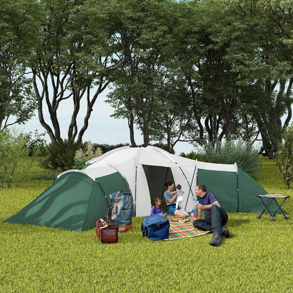 A family enjoying the large green and white camping tent set up on grass with trees around