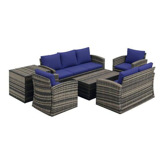 Outdoor furniture set with blue cushions on a white background