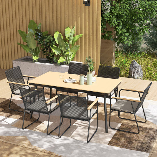The garden dining set arranged on a patio with plants and outdoor flooring