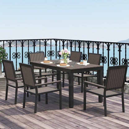 The garden dining set with six chairs around a rectangular table on a balcony