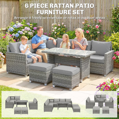 A family enjoying the grey rattan furniture set in a garden setting
