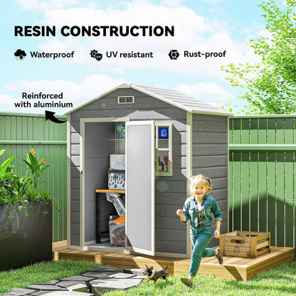 A young girl running past the grey plastic garden shed in a garden setting