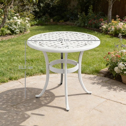 The garden table standing on a stone patio in a garden with dimension lines showing its size