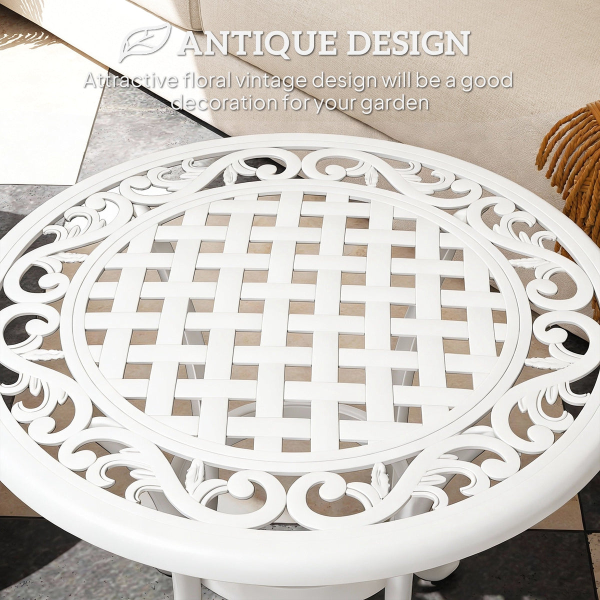 The garden table top featuring a detailed white floral and lattice pattern in an antique style
