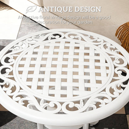 The garden table top featuring a detailed white floral and lattice pattern in an antique style