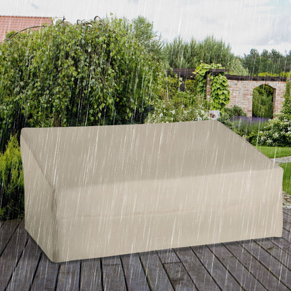 The waterproof garden furniture cover protecting a sofa from rain outdoors