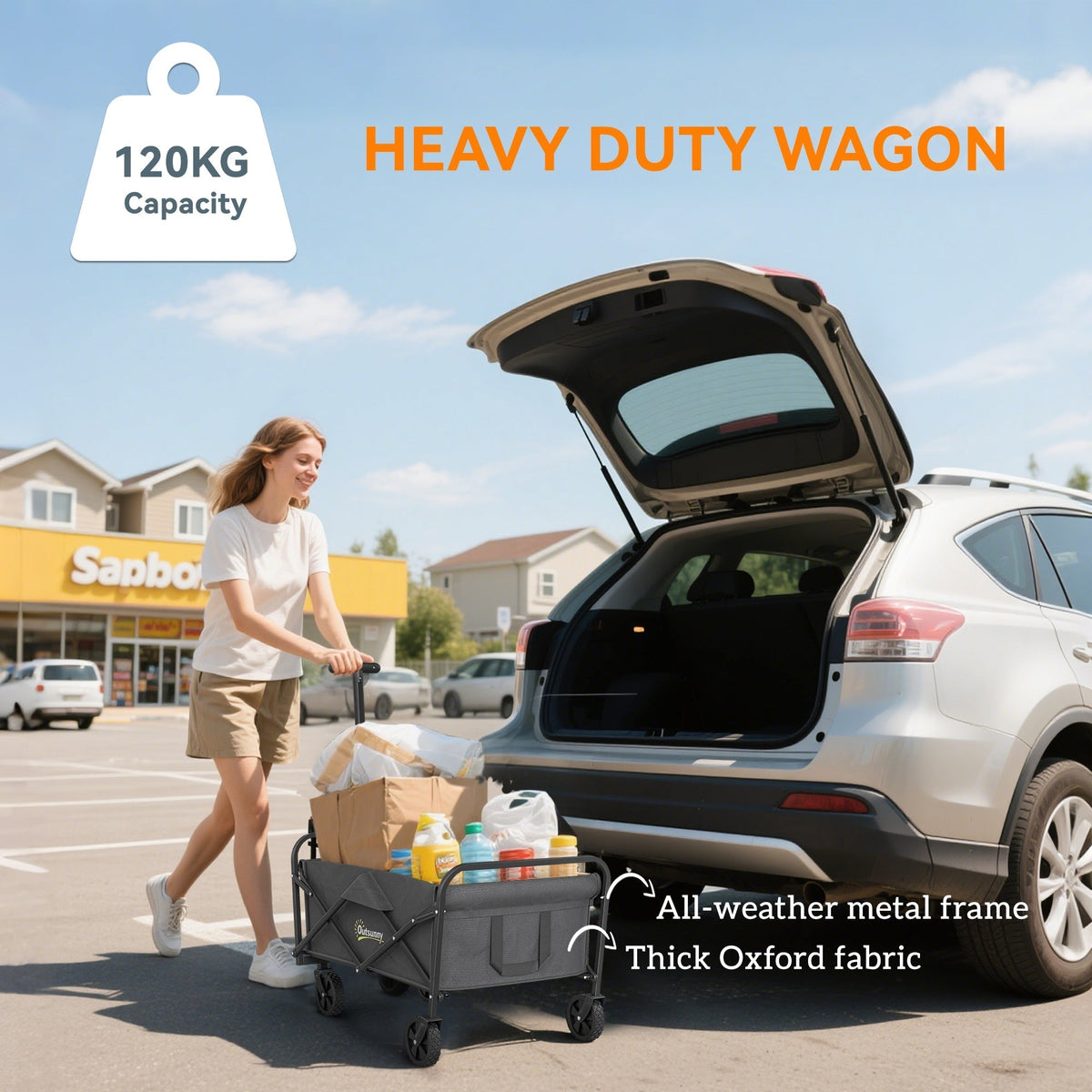 A woman loading the grey garden trolley cart next to a car boot