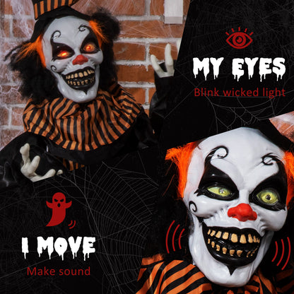 close up of the scary clown decoration's face showing its blinking light up eyes and spooky makeup