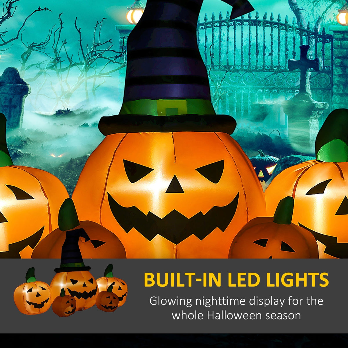 The seasonal display illuminated by internal lights in a graveyard setting
