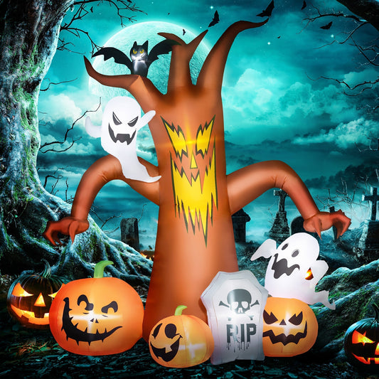 the Halloween inflatable tree at night with spooky background