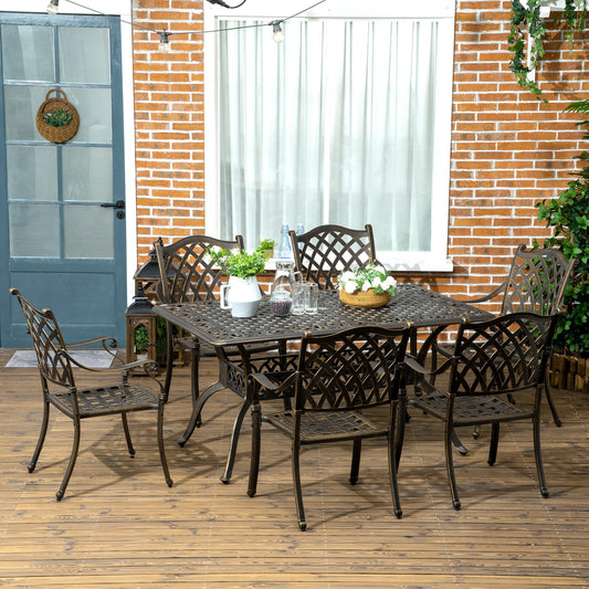 The garden dining set with six cushioned chairs and a rectangle table set up on a wooden deck
