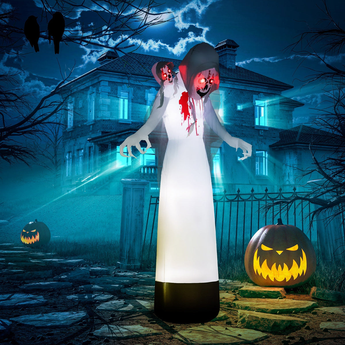 The halloween inflatable standing in a spooky garden at night with glowing jack o lanterns