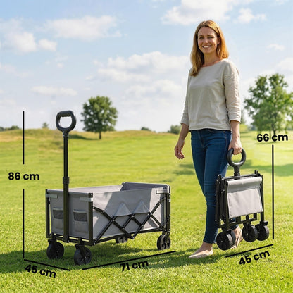 A woman holding the grey collapsible wagon cart, showing its folded dimensions