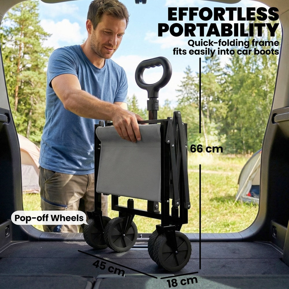A man placing the grey collapsible wagon cart into the boot of a car