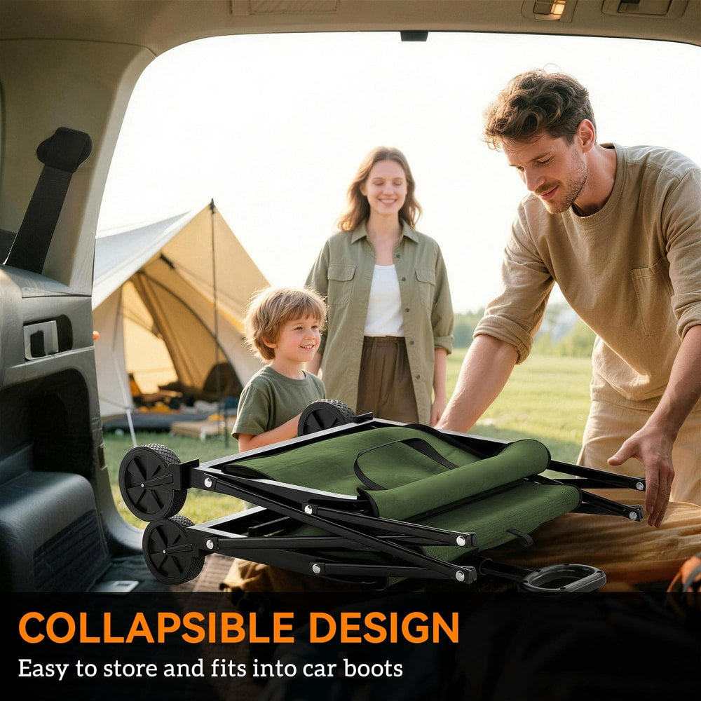The green folding garden trolley cart is shown being placed into the boot of a car