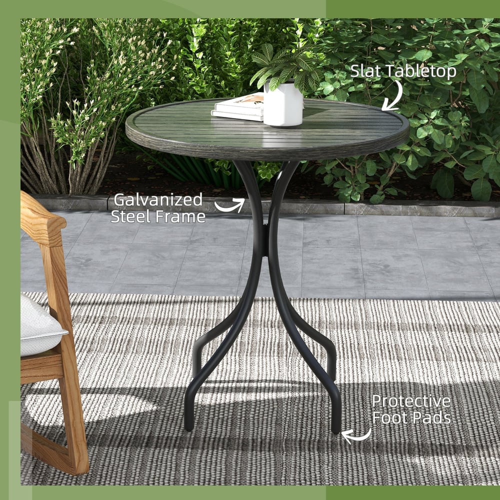 The galvanised steel garden table with labels pointing to its features