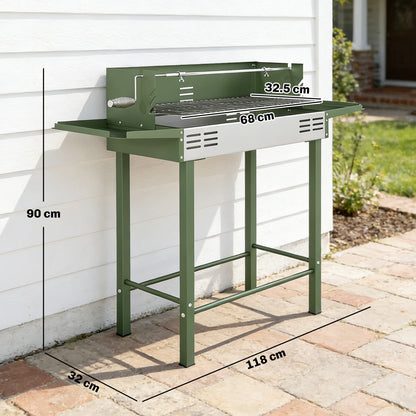The dark green charcoal grill roaster shown with dimensions marked