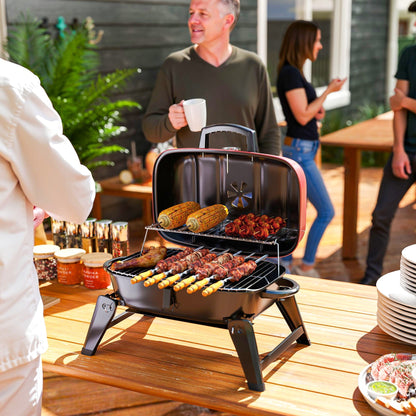 The charcoal grill being used outdoors with food cooking on the grate
