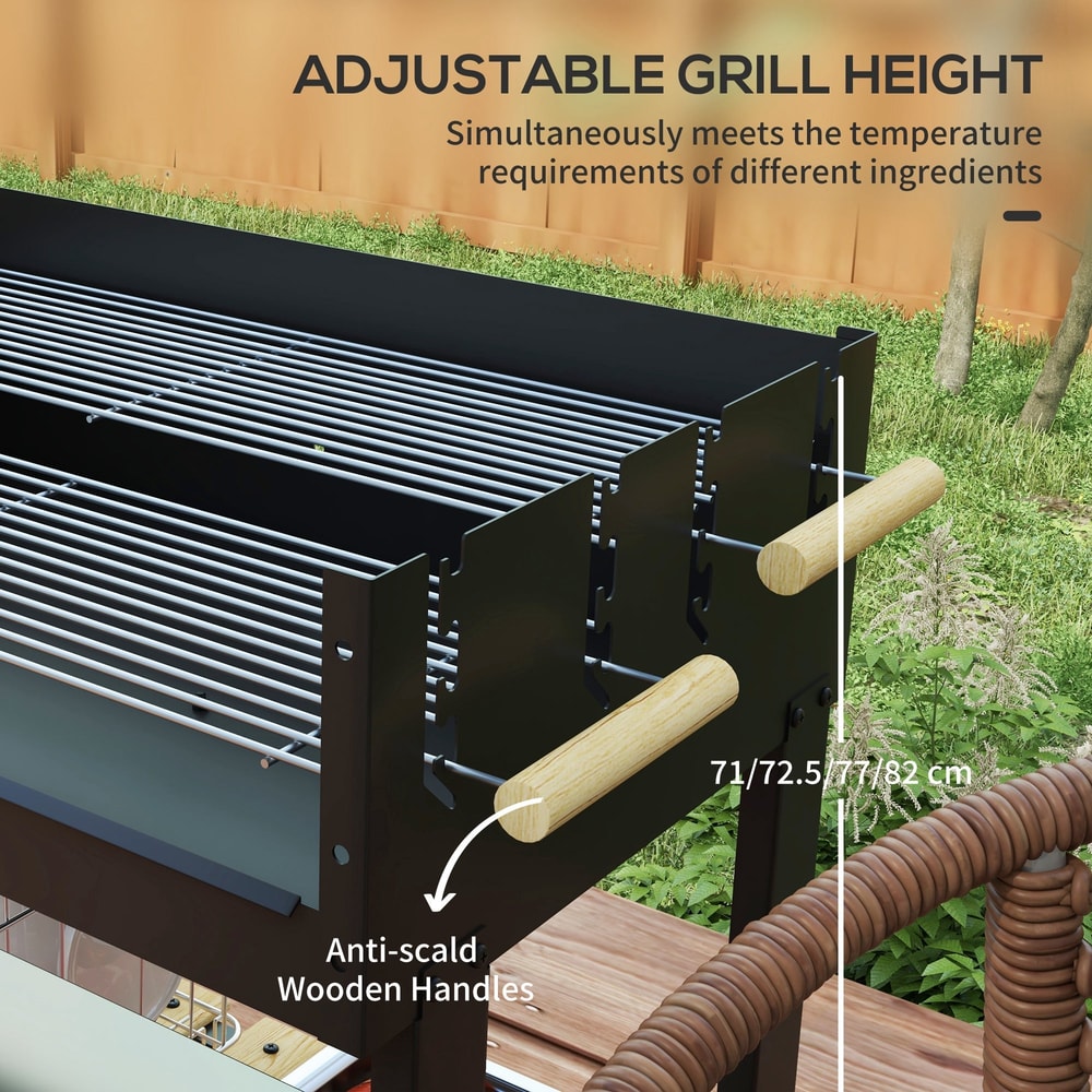 Adjustable grill height on a black trolley charcoal grill with wooden handles