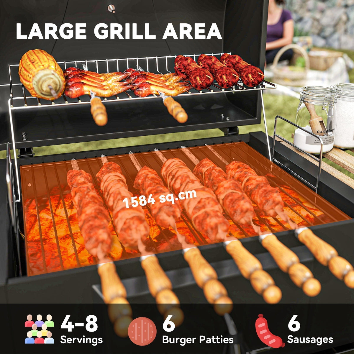 The charcoal grill cooking area showing skewers of meat and corn on the warming rack