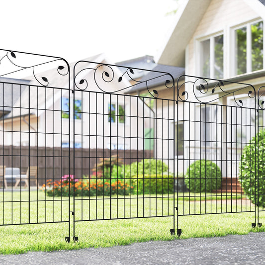 The decorative garden fencing installed along a lawn in front of a house