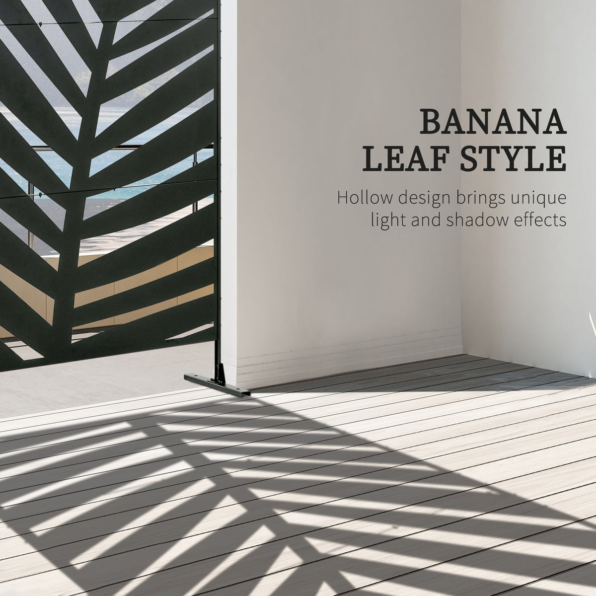 The decorative privacy panel casting striped shadows on a wooden deck, showing the banana leaf style