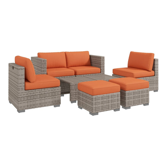 Outsunny Eight-Piece Rattan Garden Set with orange cushions arranged on a patio