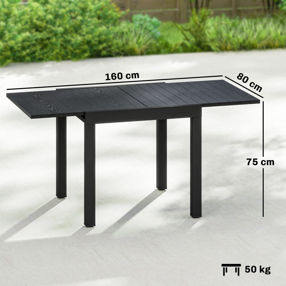 The black aluminium extending garden table with faux wood slatted top shown with dimensions